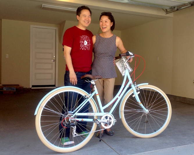 Bay Meadows residents receiving a PUBLIC bicycle, courtesy of Bay Meadows and Shea Homes.
