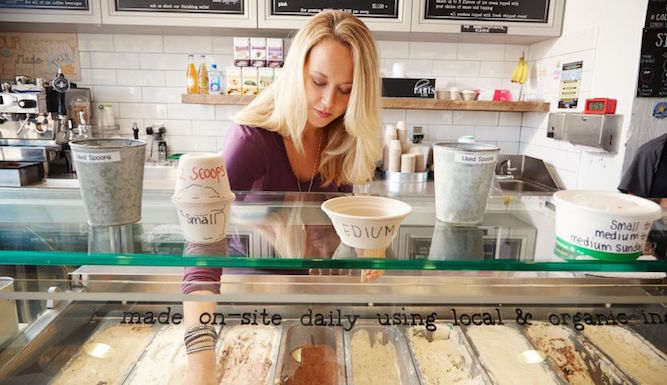 Tin Pot Creamery owner Becky Sunseri scoops up some of her delicious product.